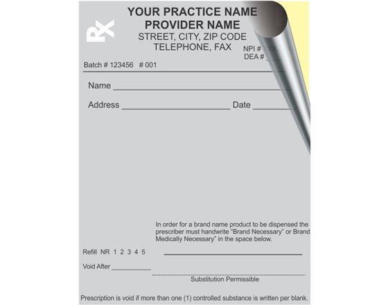 Prescription pad with a pen on a white background